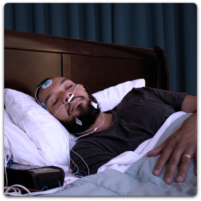 Man having an in-center sleep test